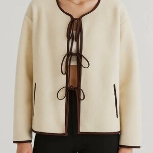 Cream Cape Jacket with Brown Trim and Tie Closures